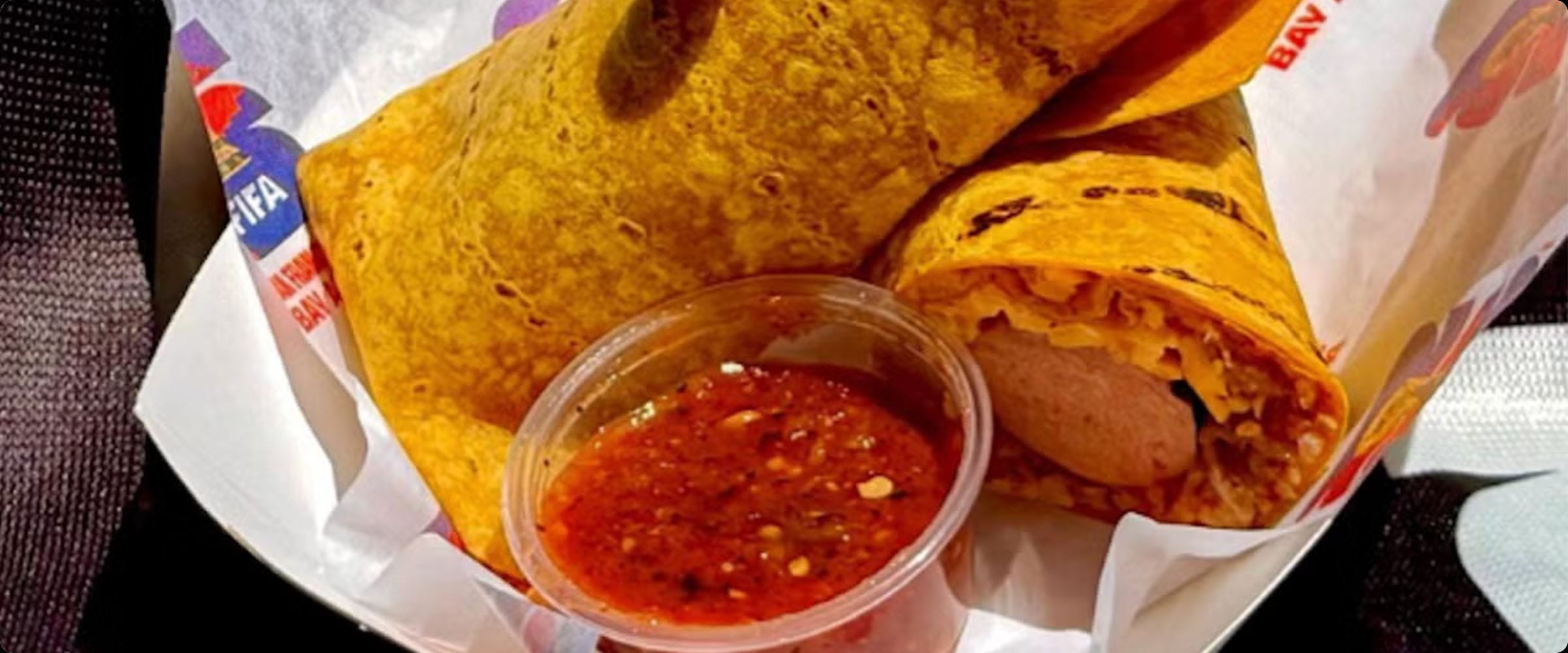 Golden wrap burrito served with red chilli dipping sauce
